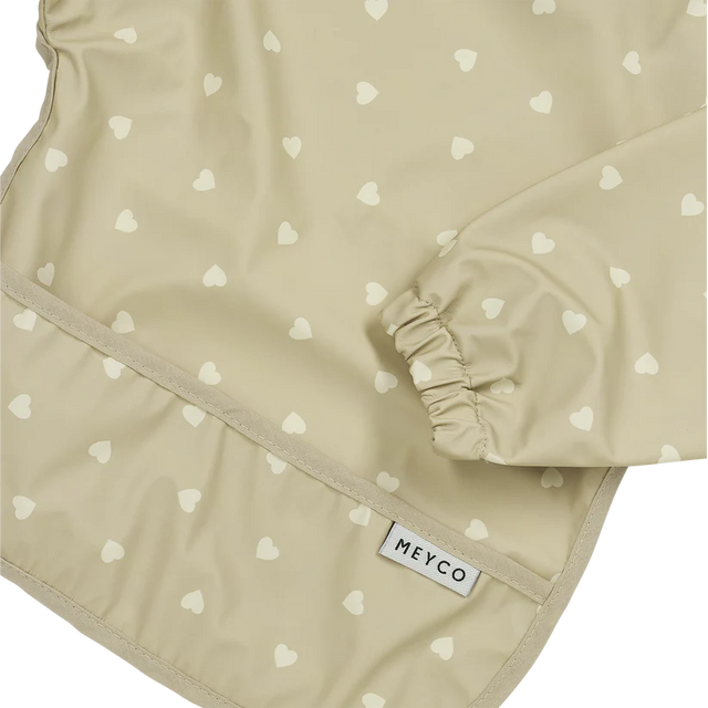 Meyco Baby neperšlampamas seilinukas su rankovėmis 6–24 mėn., Sweet Heart Sand/Soft Sand