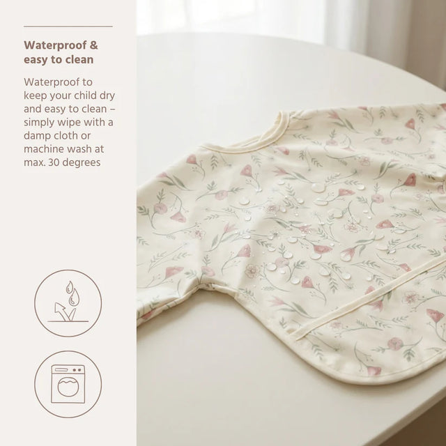 Meyco Baby neperšlampamas seilinukas su rankovėmis 6–24 mėn., Flower Multicolour