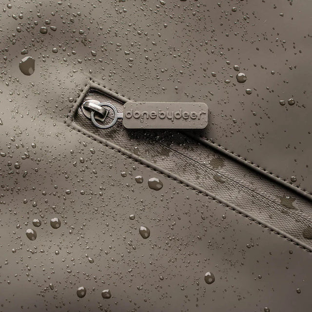 Done by Deer mähkmeseljakott, beež