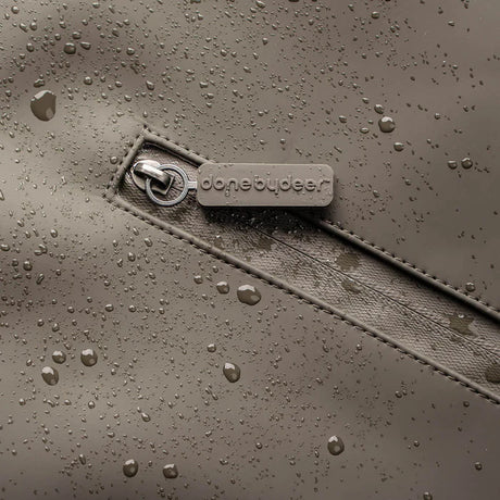 Done by Deer mähkmeseljakott, beež